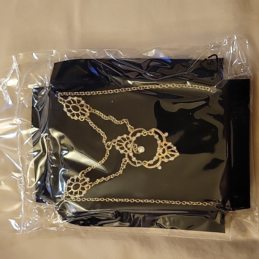 Filigree embellished necklace